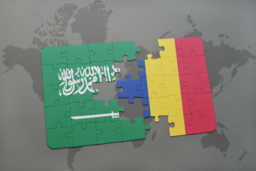 puzzle with the national flag of saudi arabia and romania on a world map background.