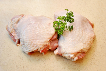 Raw Chicken Thighs with Fresh Parsley 
