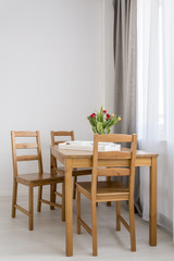 Fototapeta na wymiar Simple and functional dining room idea