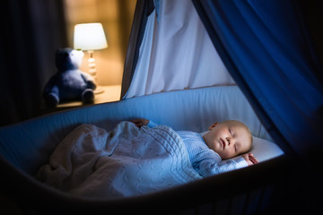 Baby boy sleeping at night