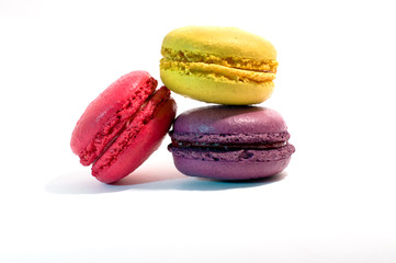 Colourful macaroons on white background