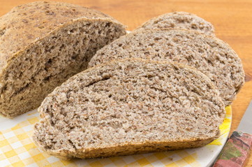 Home baked brown bread slices on the table