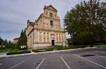 Fototapeta na wymiar Baroque facade of the Catholic church in Poznan.
