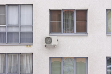 A fragment of a multi-storey residential building with installed air conditioning. Nizhny Novgorod. Russia.