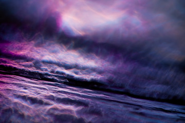 Abstract background in the form of sparkling violet plasma. - obrazy, fototapety, plakaty