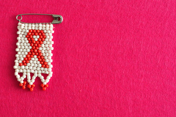 An aids ribbon as a bead work pin isolated