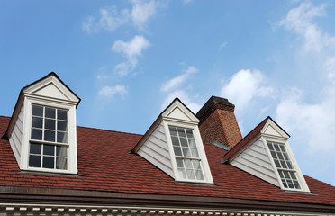 old style roof of house under the blue sky