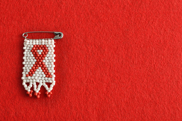 An aids ribbon as a bead work pin isolated