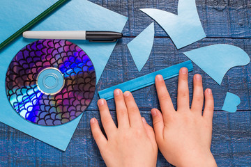 Making toy fish from the CD. Handmade children's project. Step 4