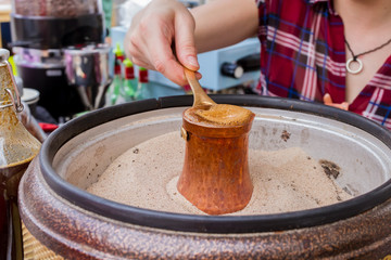 coffee cooking on sand
