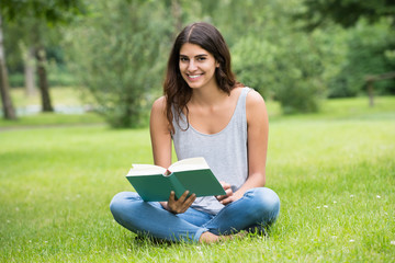 Smiling Woman Reading Book