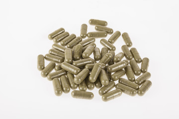Moringa capsule  on white background