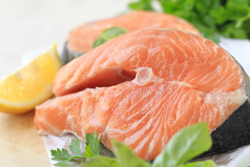 Raw fish with vegetables and lemon prepared for cooking
