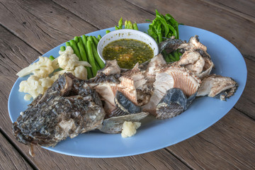 Steamed fish with hot and spicy sauce.