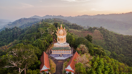 aerial photo by drone at wat Bangreang in PhangNga province.you can see Buddha with a naga on the ...