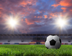 Fototapeta na wymiar Soccer ball on green stadium.