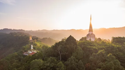 Fotobehang a style of Buddha with a naga over the head at wat Bangreang in PhangNga province.when  aerial photo by drone you can see Buddha statue,QuanYin and big pagoda on the hill top  © Narong Niemhom