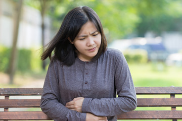 Woman Stomachache at Park