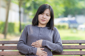Woman Stomachache at Park