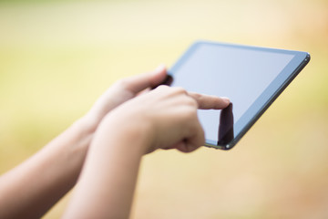 Woman Use Tablet at Park