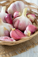 fresh garlic on wooden surface