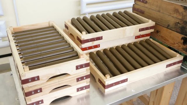 RPG explosives in one of Bulgaria's arms factory. The facility produces and assembles rocket-propelled grenades (RPG), RPG-7 launchers, RPG war heads, detonators, land mines and others. Zooming out