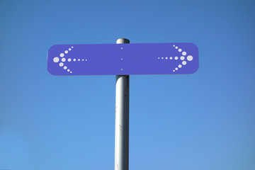 signal pointing opposite directions