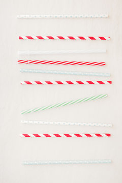 Drinking straws background. Set of different drinking straws over white background