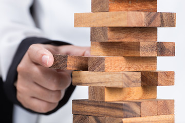 Business woman Builds a Tower