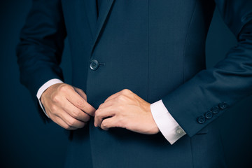 Businessman Dressing Up a Black Suit