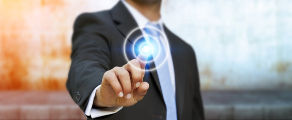 Businessman touching modern tactile screen button