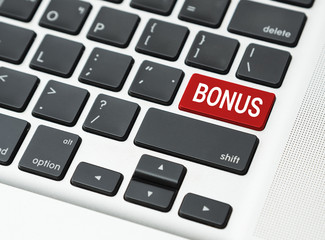 Red Key to bonus (business success concept)
