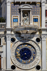 Zodiac clock Tower with winged lion and two moors (1497). Venice