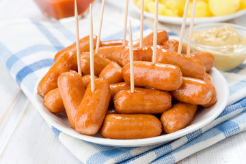 frankfurts pricked with chopsticks