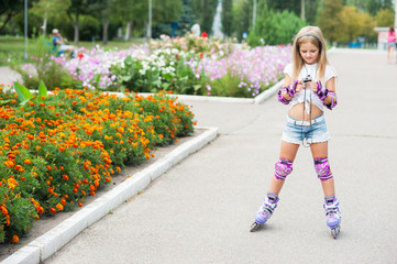 beautiful little girl on roller skates