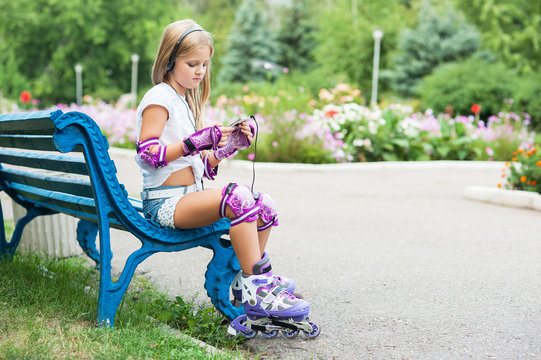 beautiful little girl on roller skates
