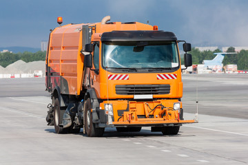 Cleaning the airport apron of the vacuum sweeper truck