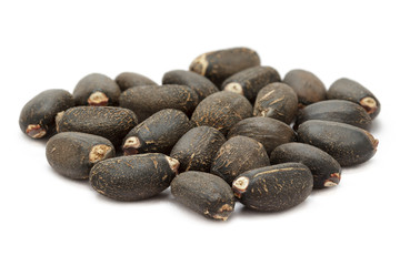 Organic (Jatropha curcas) seeds. Isolated on white background. Front view.