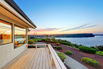 Luxury house exterior at sunset.