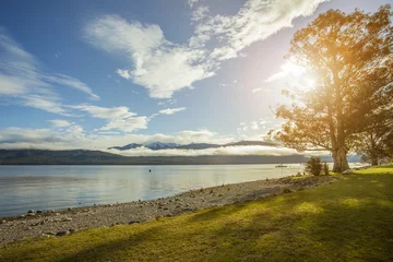 Zelfklevend Fotobehang beautiful sceninc of lake te anau important traveling destinatio © stockphoto mania