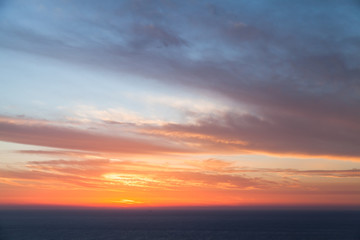 Naklejka na ściany i meble Colorful dramatic sunset. Cape Keri