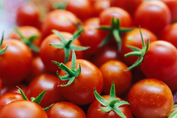 Group of red organic fresh cherry tomatoes