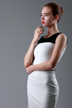 Fashion photo of young magnificent woman. Girl posing. Studio ph