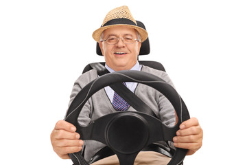Smiling senior driving