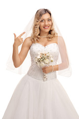 Fototapeta na wymiar Bride pointing at her hair