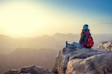girl looks at Sinai mountains 