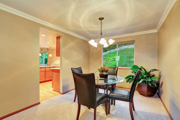 Elegant dining room interior with plant pot in the corner