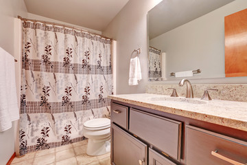 Warm tones bathroom interior.