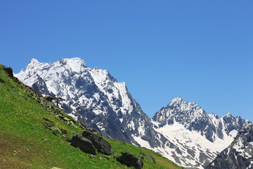 Fototapeta na wymiar Caucasus mountains summertime. The Dombai mountain landscape