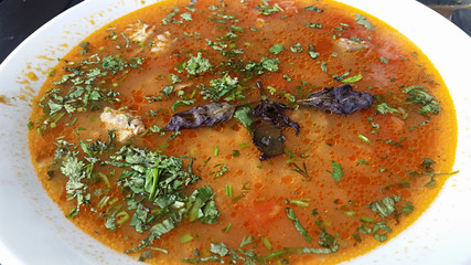 Kharcho - traditional classic spicy Caucasian soup with herbs